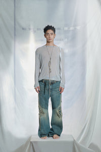 DISTRESSED PANTS