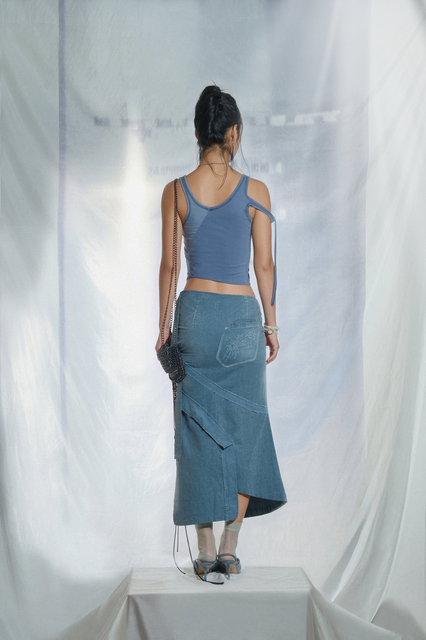 OBLIQUE SLIT LONG SKIRT